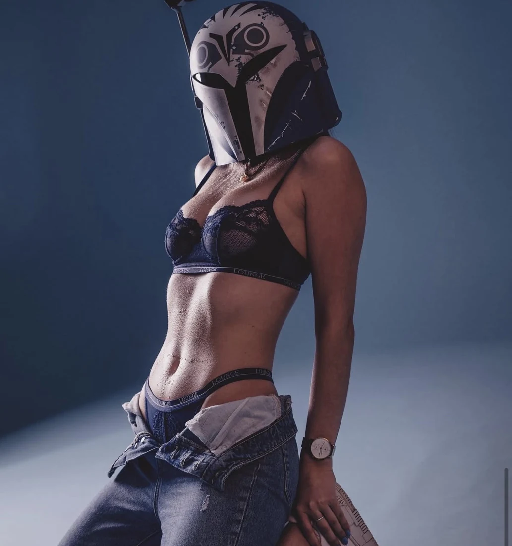 Original Star Wars inspired fashion photograph with a Mandalorian helmet